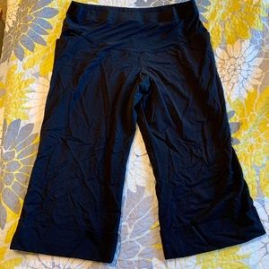 Mid calf black maternity pants. Cuffed hem.